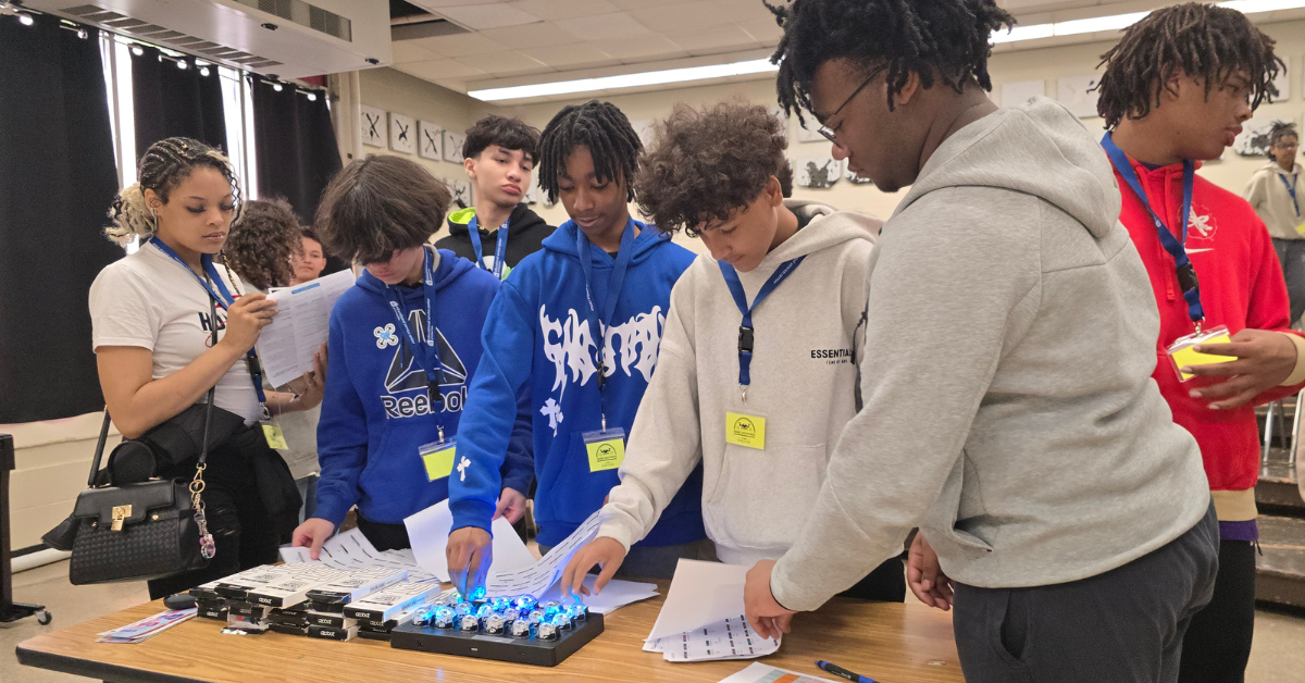 students observing small drones